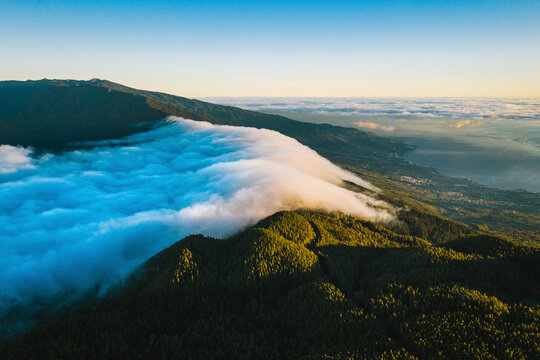 Aerial view of La Palma Island nature landscape early in the morning with Santa Cruz in background at sunrise, Canary Islands, Spain.