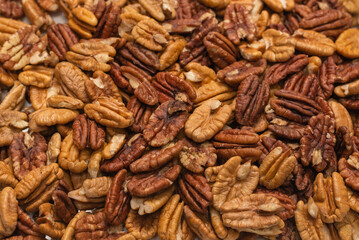 Tasty pecan-nut background. Top view.