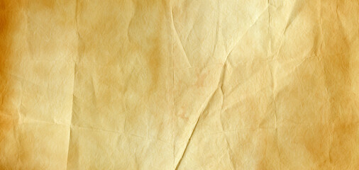 Old brown crumpled paper texture background. Horizontal banner