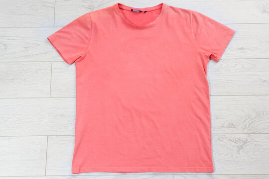Pink T Shirt Mock Up On Wooden Background Top View, Red T-shirt Background