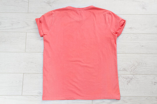 Pink T Shirt Mock Up On Wooden Background Top View, Red T-shirt Background