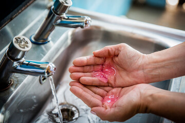 UK, England, Devon, Close-up of woman's hands with soap