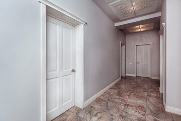 stylish white hallway with doors