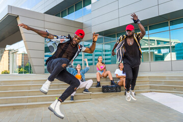 Hip hop crew dancing outdoors