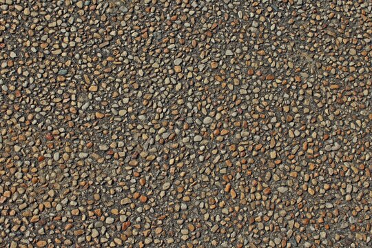 Pattern of pebbles in concrete