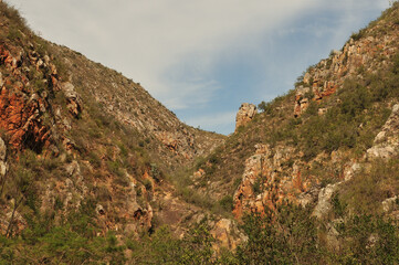 Rocks forming a frame around dramatic cloud patterns in the Outeniqua Mountains of the Western Cape