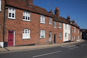 Rows of red brick houses in Henley on Thames in Oxfordshire in the UK;