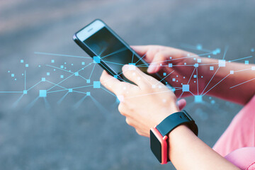 woman using smartphone network for gps map searching location on adventure travel trip on nature...