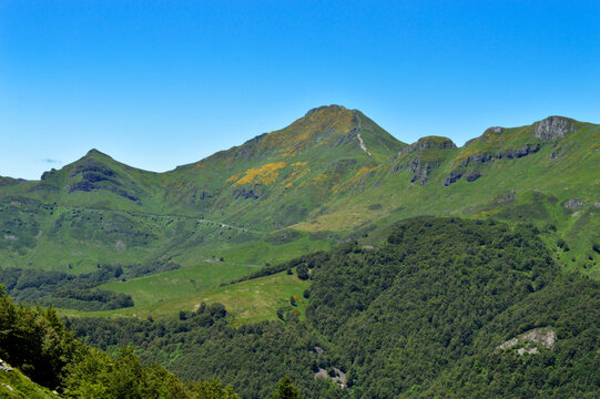 Magnificent view of a panorama of volcanic mountains in a national park in a wild region, in Auvergne