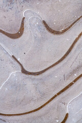 texture of ice on puddle