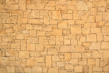 Fototapeta premium Background of decorate sand stone wall surface