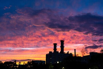 There is factory in sunset