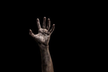 scary zombie hand isolated on black with dirty fingernails.
