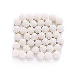 White pills on a white background.  round pills close-up. Healthcare and medicine.