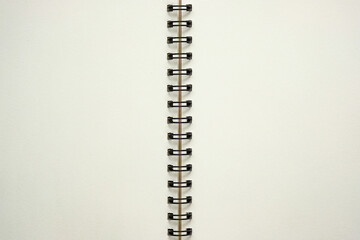 Top view, open blank spiral notebook, copy space for your text.