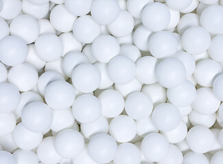 Background from white plastic balls