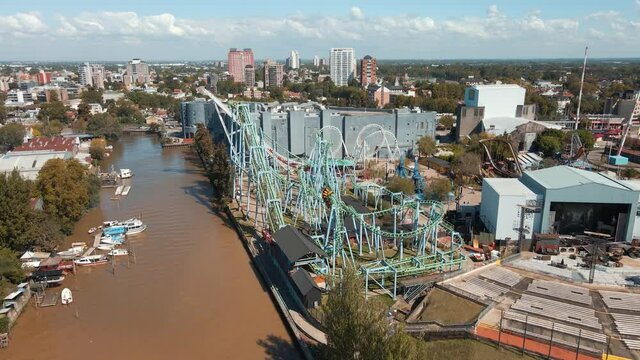 The Challenge Roller Coaster Ride At Costa Amusement Park Along Lujan River In Tigre, Argentina. - aerial approach