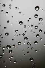 Water drops on the gray background