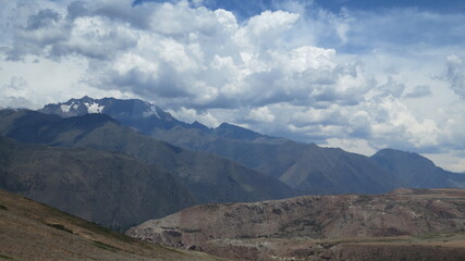 landscape with gray clouds and blue sky