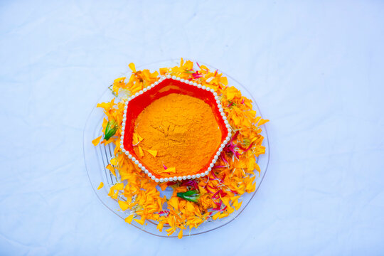 Traditional wedding ceremony in Hinduism: Turmeric in plate for haldi ceremony