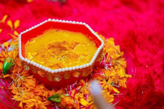 Traditional wedding ceremony in Hinduism: Turmeric in plate for haldi ceremony Stock Photo | Adobe Stock Traditional wedding ceremony in Hinduism: Turmeric in plate for haldi ceremony Stock Photo | Adobe Stock