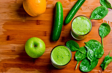 Smoothies. Green health shake with farm fresh organic fruits and vegetable. Persian cucumbers, Granny Smith apples and lettuce smoothie.