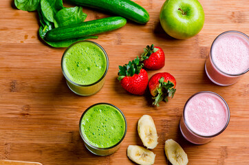 Smoothies. Green health shake with farm fresh organic fruits and vegetable. Persian cucumbers, Granny Smith apples and lettuce smoothie.