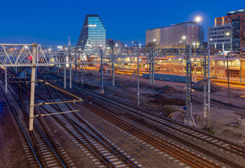 Fototapeta premium Railroad tracks at Poznan train station at dawn. Poland.