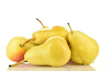 Several ripe light yellow pears, close-up, isolated on white.