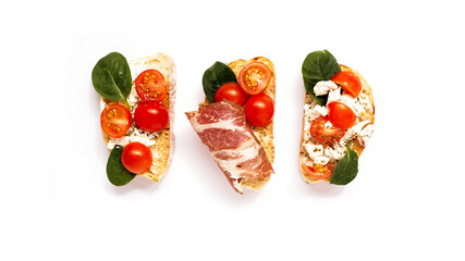 Three bruschetta on a ciabatta on a white plate. Italian appetizer