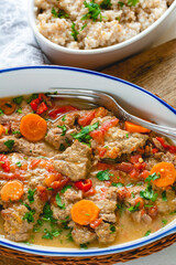 Beef stew in gravy with vegetables. Meat goulash