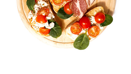 Bruschetta is usually served as snack or appetizer. Italian set on wooden board