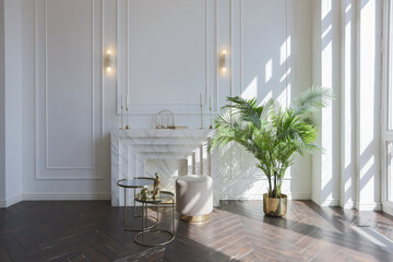 very light and bright interior of luxurious cozy living room with chic soft beige furniture with gold metallic elements, huge window to the floor and wooden parquet