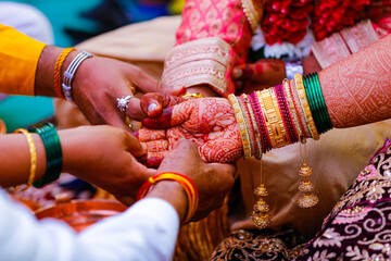 Indian traditional wedding ceremony bridal and groom hand