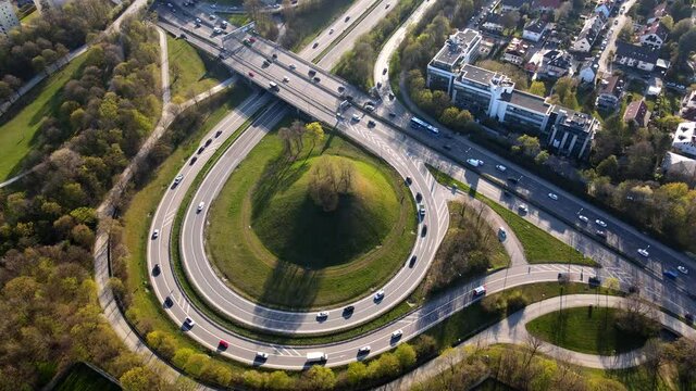 Aerial of traffic during rush hour, motorway in Munich Germany Europe in 4k, intersection with lots of cars in urban area ,drone