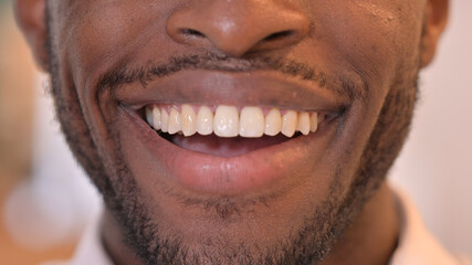 Close up of Lips of Smiling African Man 