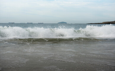 Fototapeta premium Brasil, Rio de Janeiro. Ocean surf on Copacabana beach