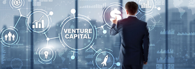 Venture capital. Investor capital. Businessman pressing virtual screen inscription