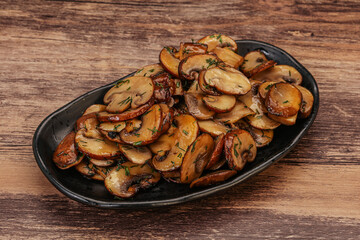 Roasted champignon with herbs and spices