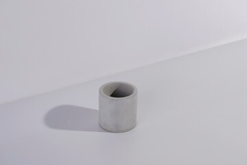 concrete cylinder on a light background