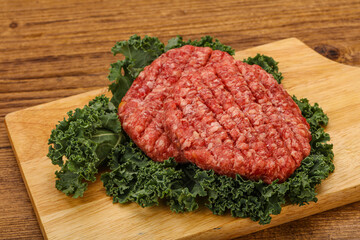 Raw beef burger cutlet for cooking