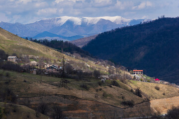 Fototapeta na wymiar Amazing spring landscape with trees and mountains, Armenia