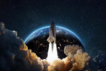 Rocket successful takeoff into deep starry space against the backdrop of the blue earth planet....