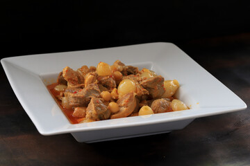 Turkish style meat roast with small shallots and chickpeas. Turkish stew