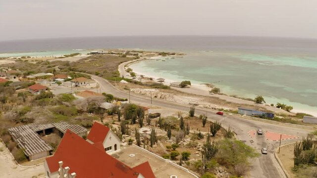 aerial image with drone of the baby beach in aruba in the caribbean