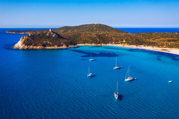 Torre di Porto Giunco Tower and Simius Beach near Villasimius, Sardinia, Italy. View from flying...