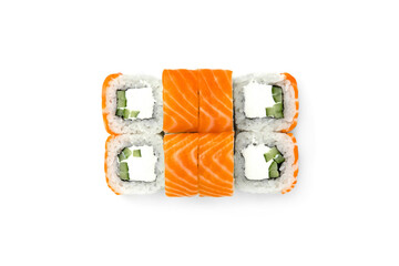 Rolls Philadelphia with salmon, cucumber and soft cheese, top view. Delicious traditional Japanese food with sushi rolls isolated on white, close up.