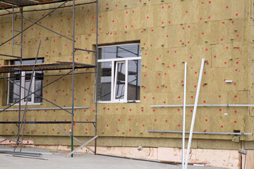 Thermal insulation of a multi-storey building with special materials.