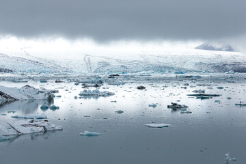 Iceland's glacier Jokulsarlon through the breakaway icebergs.