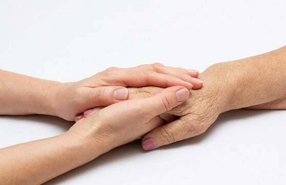 Old And Young Hands; Offering Comfort Care